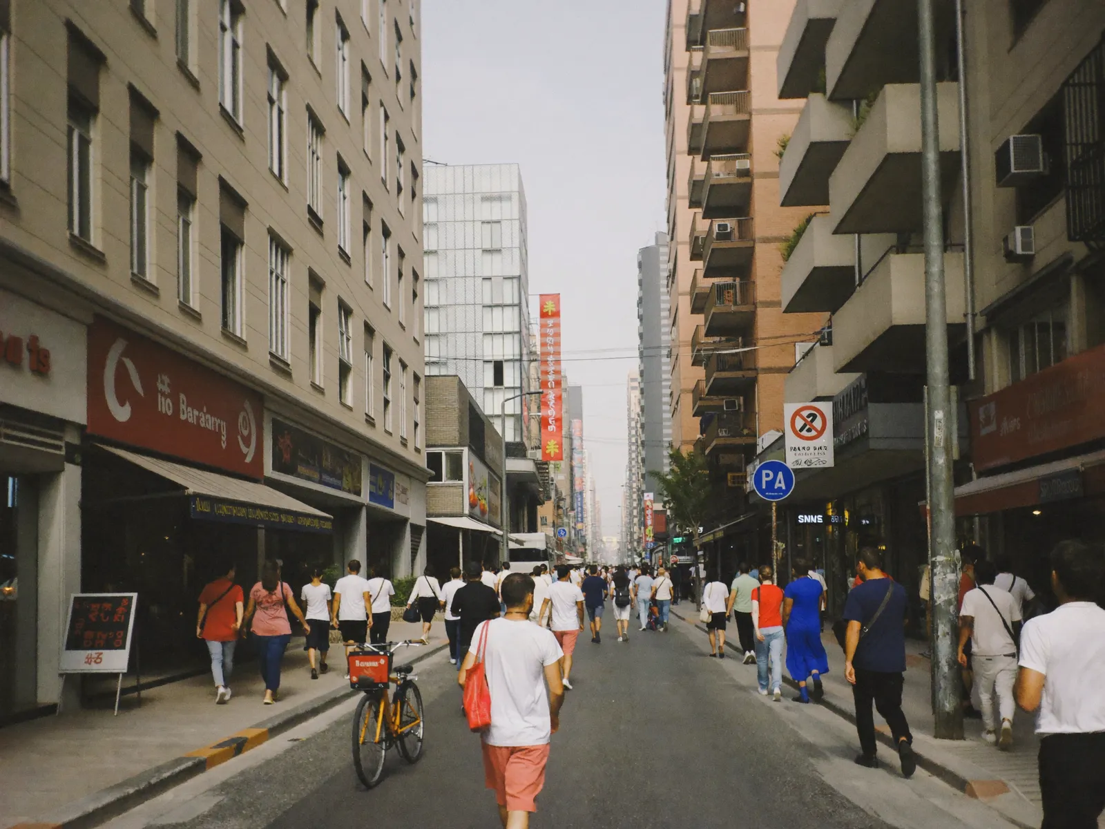 Busy residential street with mid-rise apartment buildings in Al Barsha, Dubai